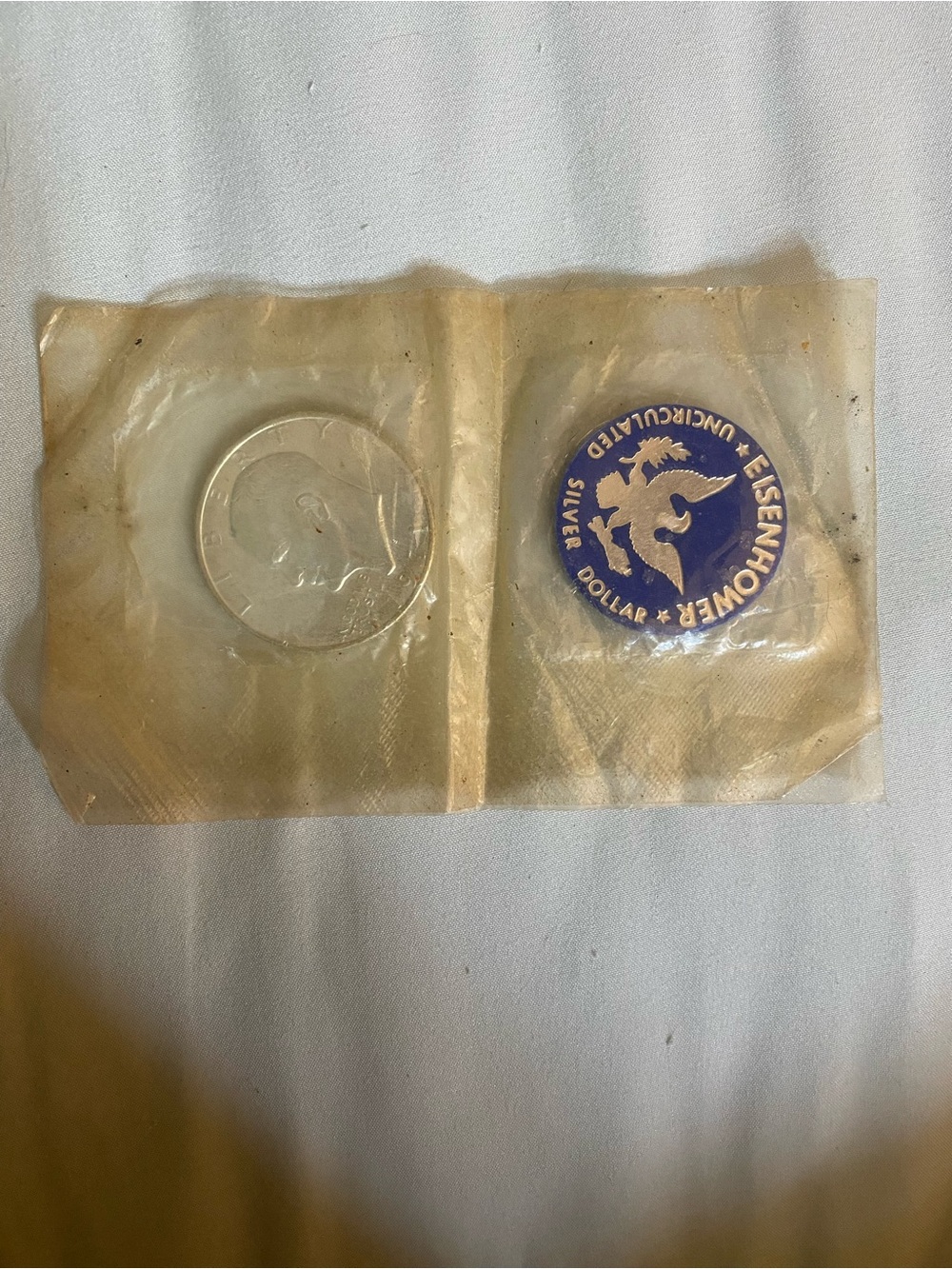 Uncirculated Eisenhower Silver Dollar & Blue Chip - 40% Silver